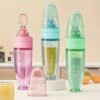 New 90ml/3OZ Colorful Silicone Baby Bottle Feeder with Soft Spoon, Suction Cup and Dust Cap, Portable Squeeze Feeding Bottle New 90ml/3OZ Colorful Silicone Baby Bottle Feeder with Soft Spoon, Suction Cup and Dust Cap, Portable Squeeze Feeding Bottle